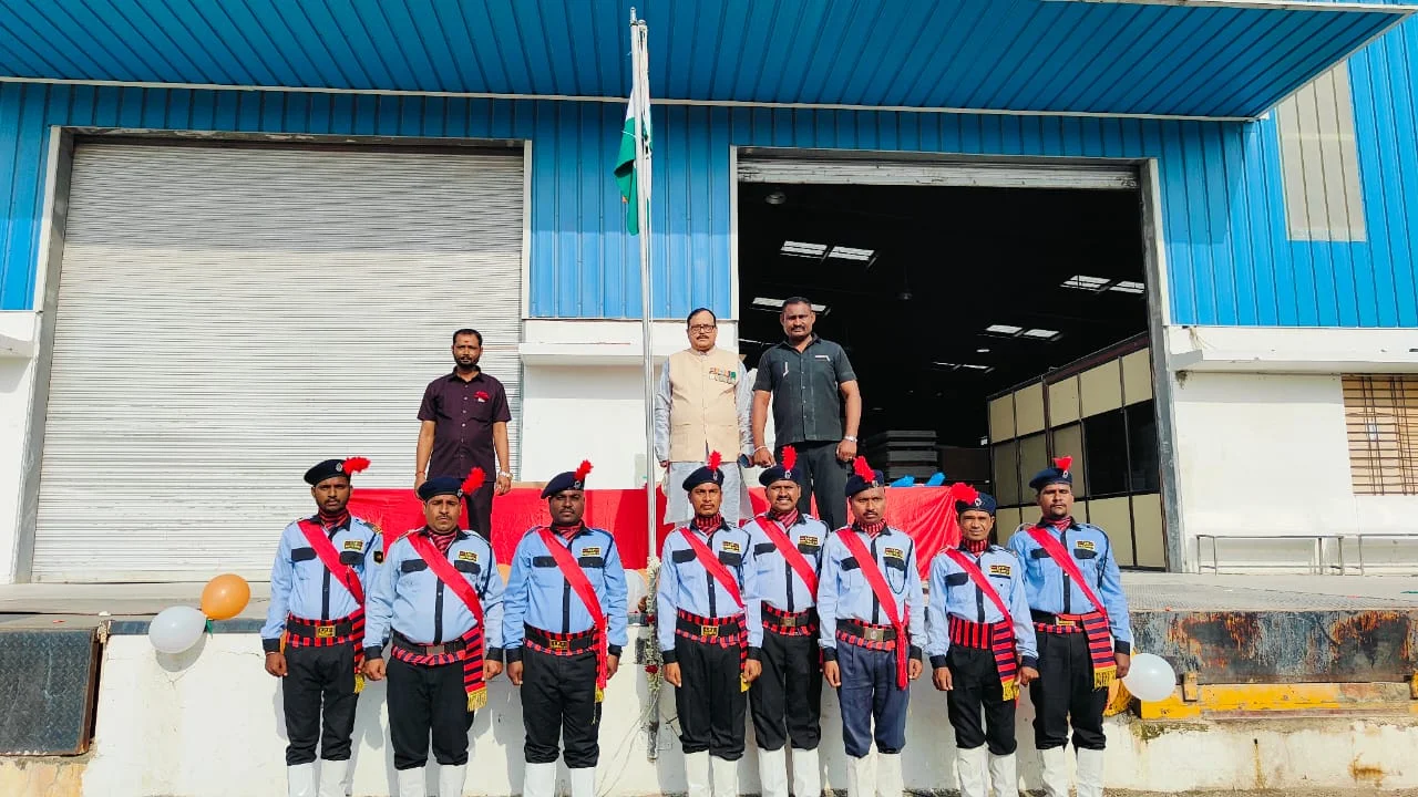 Security team in ceremonial uniform outside a warehouse